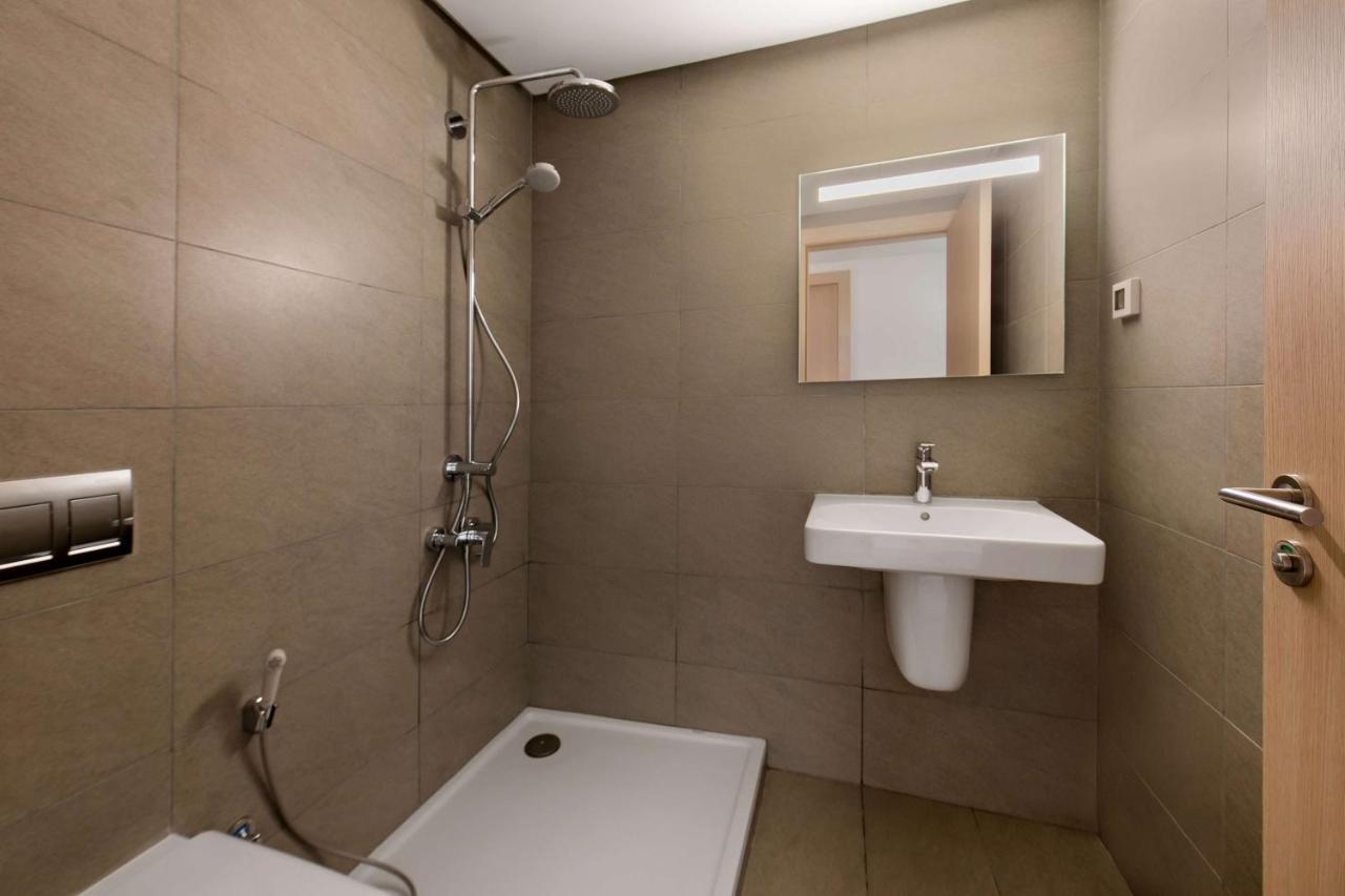 Radisson Blu Residences Эль-Хосейма Экстерьер фото